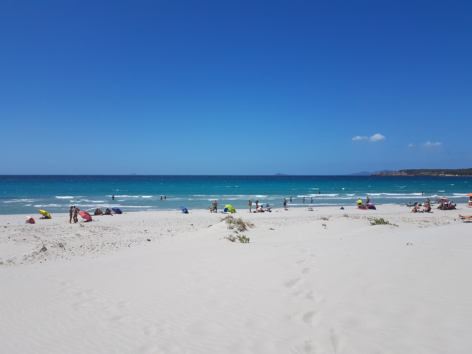 Zdjęcie Plaża Porto Pino - polecane dla podróżujących z dziećmi rodzinnych