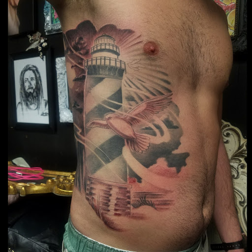 Explore loss tattoo ideas, creative tattoo ideas in Elizabeth City, available at Wolfs Den Custom Tattoo & Body Piercing Studio