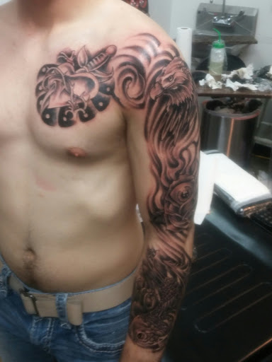 Explore hand and wrist tattoo ideas, creative tattoo ideas in Enid, available at IRONHORSE TATTOO & BODY PIERCING STUDIO,LLC