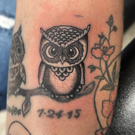 Explore tattoo ideas with flowers and names, creative tattoo ideas in Hudson Falls, available at ALTERED ADDICTION TATTOOS