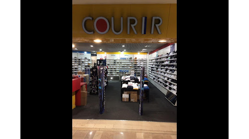 Magasin de chaussures Courir Tende