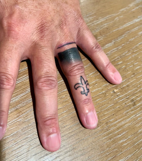 Explore stamp tattoo ideas, creative tattoo ideas in Biloxi, available at Artisan Ink Studio