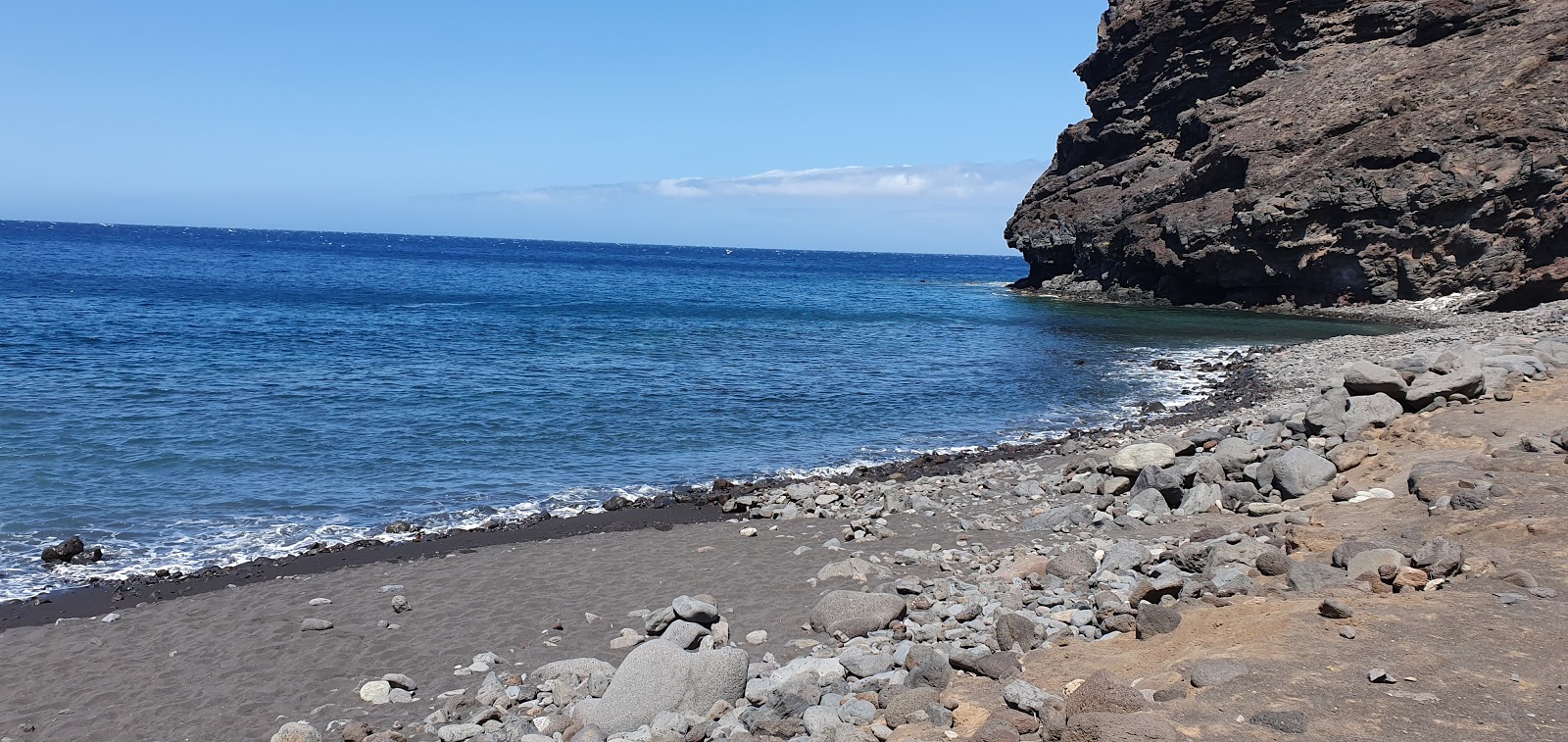 Playa de Tasartico'in fotoğrafı geniş plaj ile birlikte