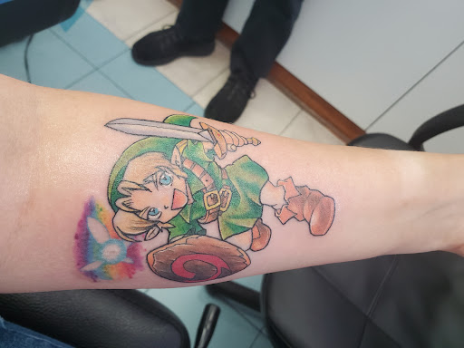 Explore tribal bear tattoo ideas, creative tattoo ideas in Hampton, available at Blue Horseshoe Tattoo and Body Piercing