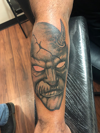 Explore strawberry tattoo ideas, creative tattoo ideas in Alamosa, available at The Shop Tattoo & Comics