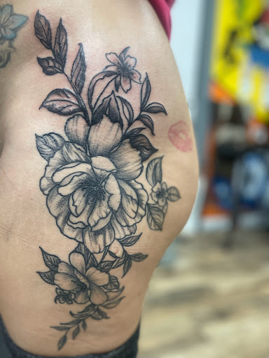 Explore feather tattoo ideas for men, creative tattoo ideas in Mount Holly, available at Permanent Vacation Tattoos