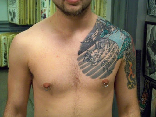 Explore female tattoo ideas for arm, creative tattoo ideas in Wilmington, available at Wildcard Studios