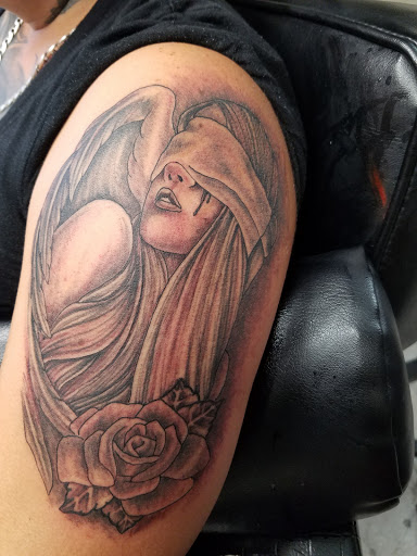 Explore biceps tattoo ideas, creative tattoo ideas in Englewood, available at White Eagle Tattoo