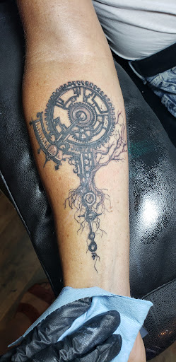 Explore depressing tattoo ideas, creative tattoo ideas in Cornelia, available at Prismatic Pulse Tattoo