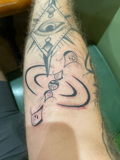 Explore small bee tattoo ideas, creative tattoo ideas in Stuart, available at Tiger Shark Tattoo Studio