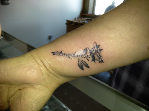 Explore fatherhood tattoo ideas, creative tattoo ideas in Hebron, available at Explosive Ink Tattoo