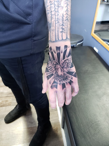 Tattoo Shop «Next Level Tattoo Company - Imlay City», reviews and photos, 420 E 3rd St, Imlay City, MI 48444, USA