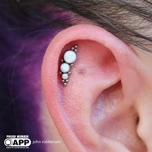 Explore black mens tattoo ideas, creative tattoo ideas in Fort Myers, available at Tiger Lotus Tattoo and Piercing