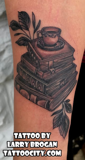 Explore wow tattoo ideas, creative tattoo ideas in Lockport, available at Tattoo City by Larry Brogan