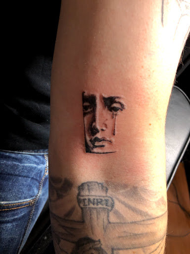 Explore kiss lip tattoo ideas, creative tattoo ideas in Scarsdale, available at Damm Nice Tattoo & Body Art