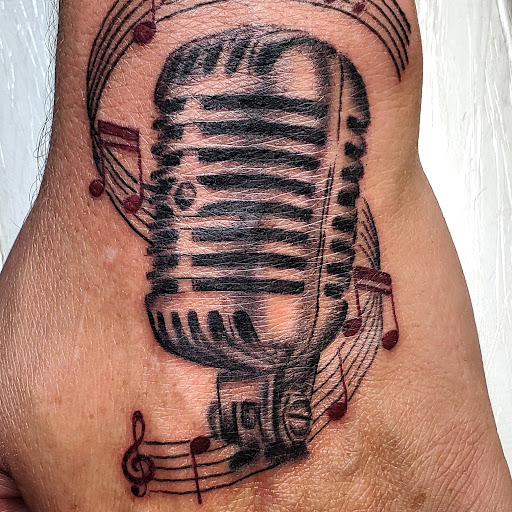 Explore tattoo ideas for the back of the neck, creative tattoo ideas in Shelbyville, available at The Copper Phoenix