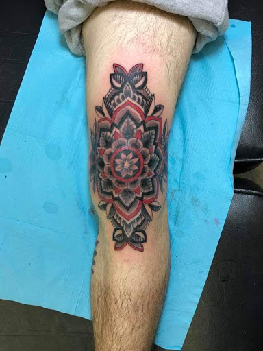 Explore loyalty over love tattoo ideas, creative tattoo ideas in Johnstown, available at Lemon Bomb Tattoo Co.