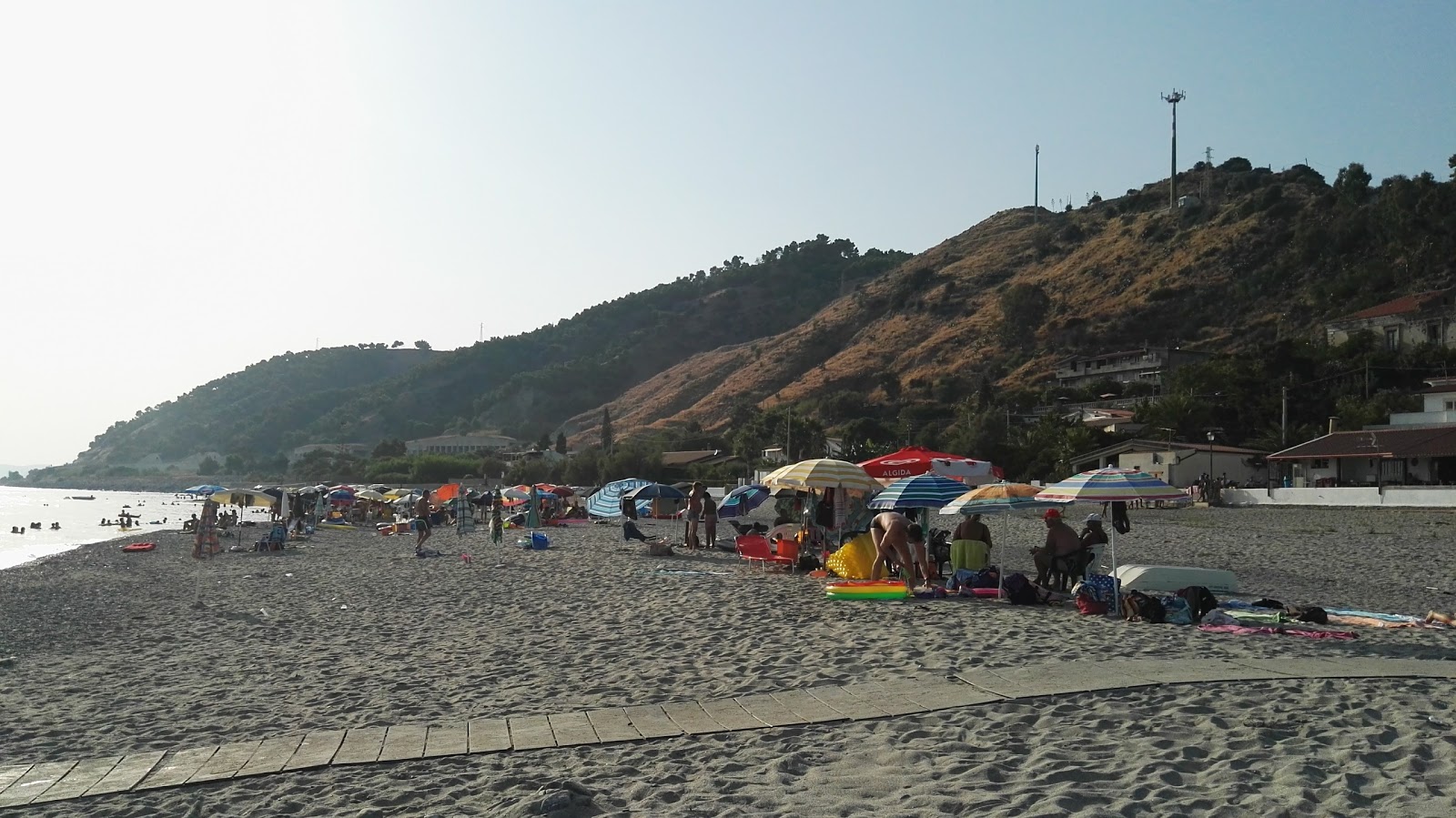 Fotografija Ultima Spiaggia in naselje
