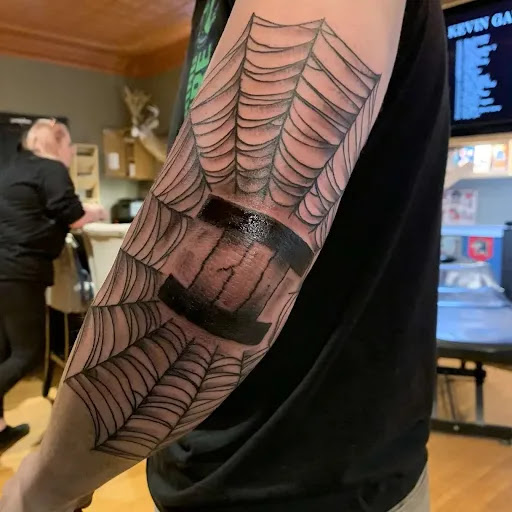 Explore smile tattoo ideas, creative tattoo ideas in Webster, available at The Modified Collective