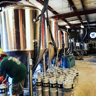 A row of beer taps