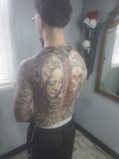 Explore compass tattoo ideas, creative tattoo ideas in Elyria, available at Raven Ink Tattoo & Piercing