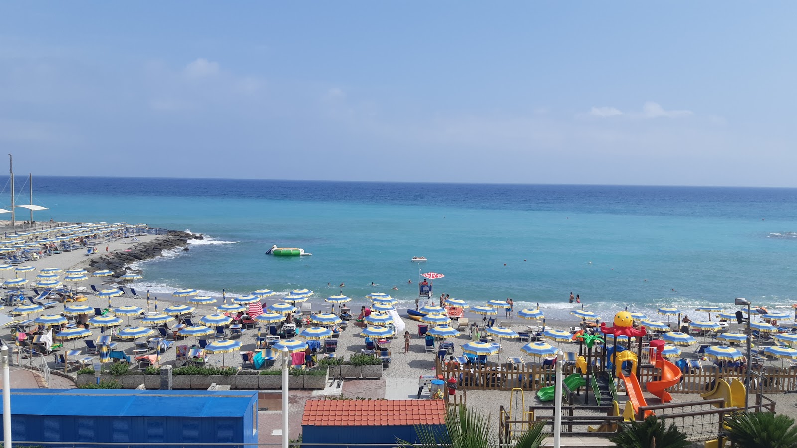 Foto van Spiaggia di Borghetto met hoog niveau van netheid
