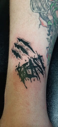 Explore tattoo ideas in spanish, creative tattoo ideas in Sunbury, available at Axonic Inkworks Custom Tattoo Studio