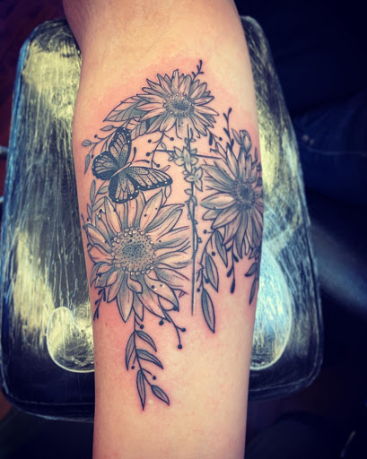 Find breast tattoo ideas for females for your next unique tattoo in Williamsport at Moa Tattoos