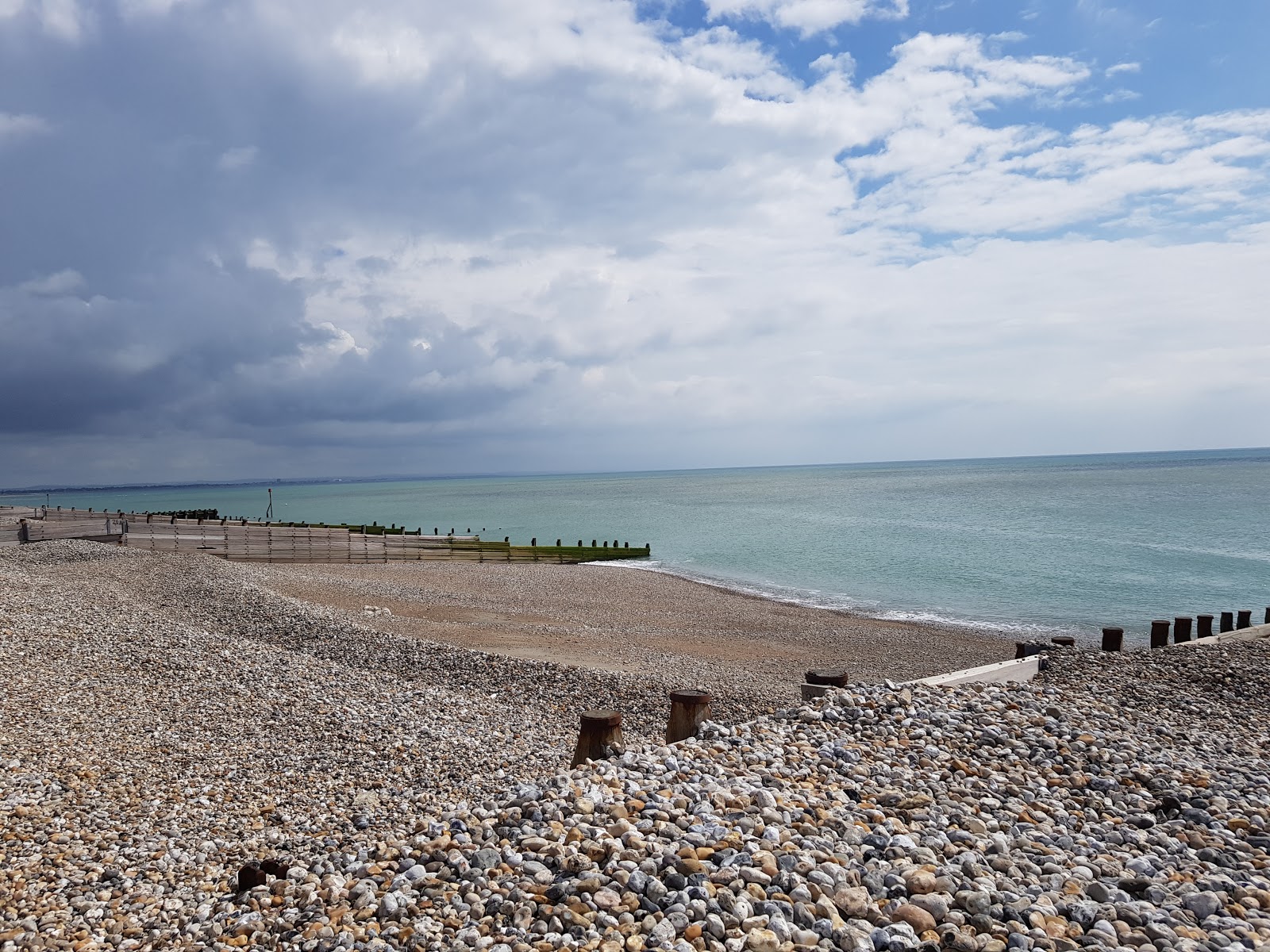 Foto van East beach met blauw puur water oppervlakte