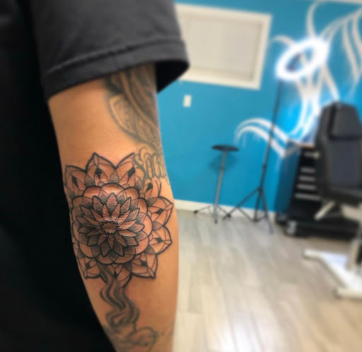 Explore heart and rose tattoo ideas, creative tattoo ideas in Springdale, available at Tattoo Cartel