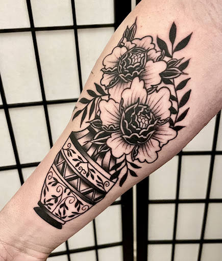 Wilted Rose Tattoo Club
