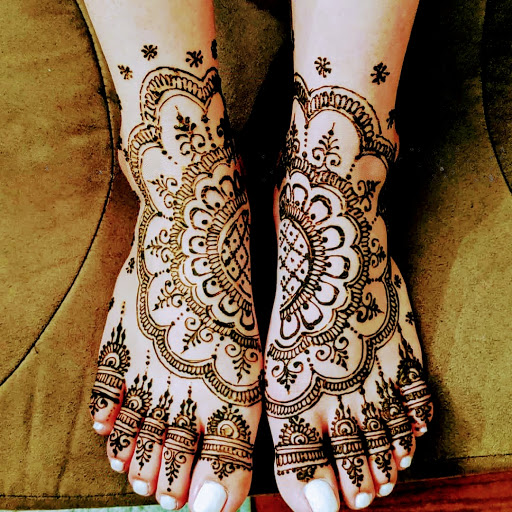 Explore tattoo ideas for family tree, creative tattoo ideas in Concord, available at Naseera Fazil Henna Art