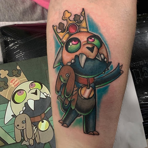 Explore mens quad tattoo ideas, creative tattoo ideas in Clinton, available at Black Relic Tattoo