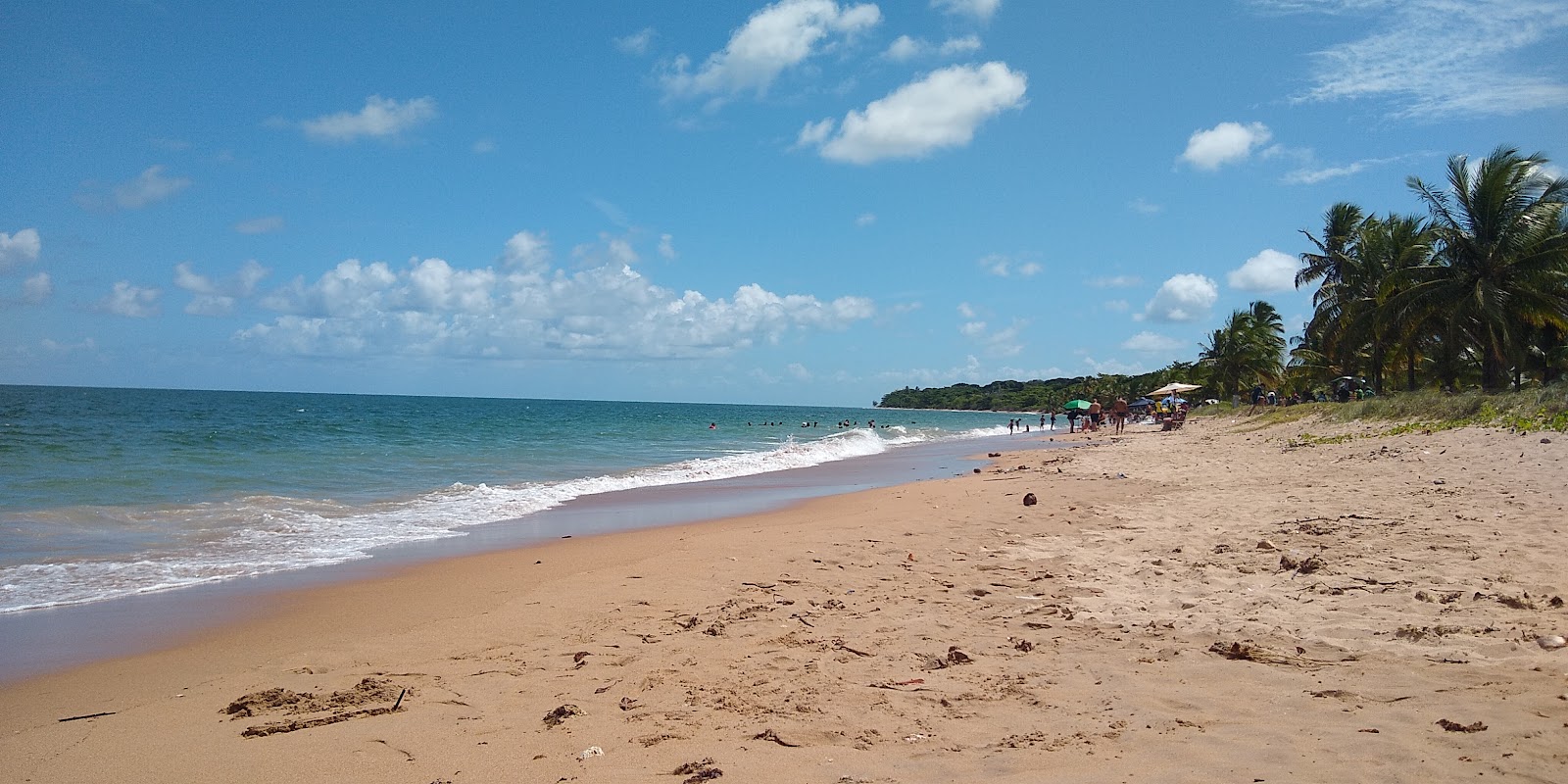Foto de Berlinque Beach con arena beige superficie
