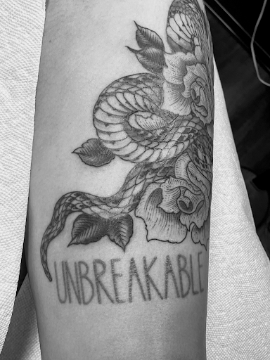 Explore dog nose tattoo ideas, creative tattoo ideas in Georgetown, available at Iron Rite Tattoo South