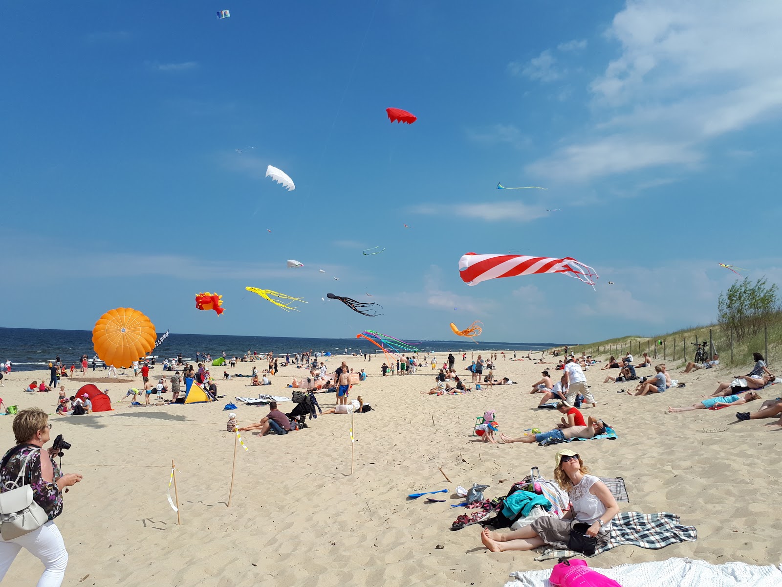 Photo of Gdansk beach ent 16 with bright fine sand surface