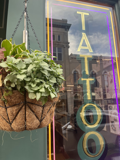 Explore floral tattoo ideas for females, creative tattoo ideas in Muncie, available at Fox & Sparrow Tattoo