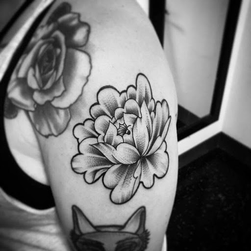 Explore face tattoo ideas for men, creative tattoo ideas in Denison, available at Calypso Tattoo