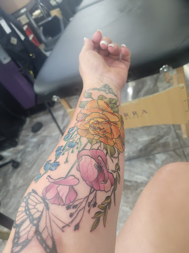 Explore tattoo coverup ideas, creative tattoo ideas in Spring, available at Skin Stories Tat2