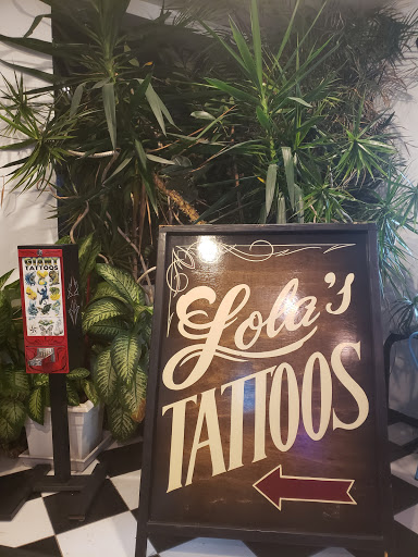 Explore back of ear tattoo ideas, creative tattoo ideas in Bogota, available at Lolas Tattoo Shop