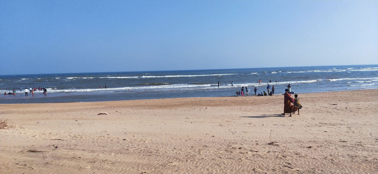 Foto van Ganagalla Peta Beach met helder zand oppervlakte