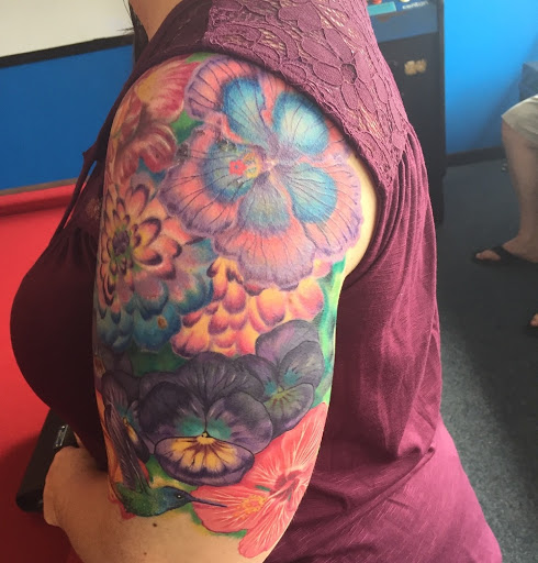 Explore tattoo word cover up ideas, creative tattoo ideas in Crystal River, available at Americas Best Tattoos