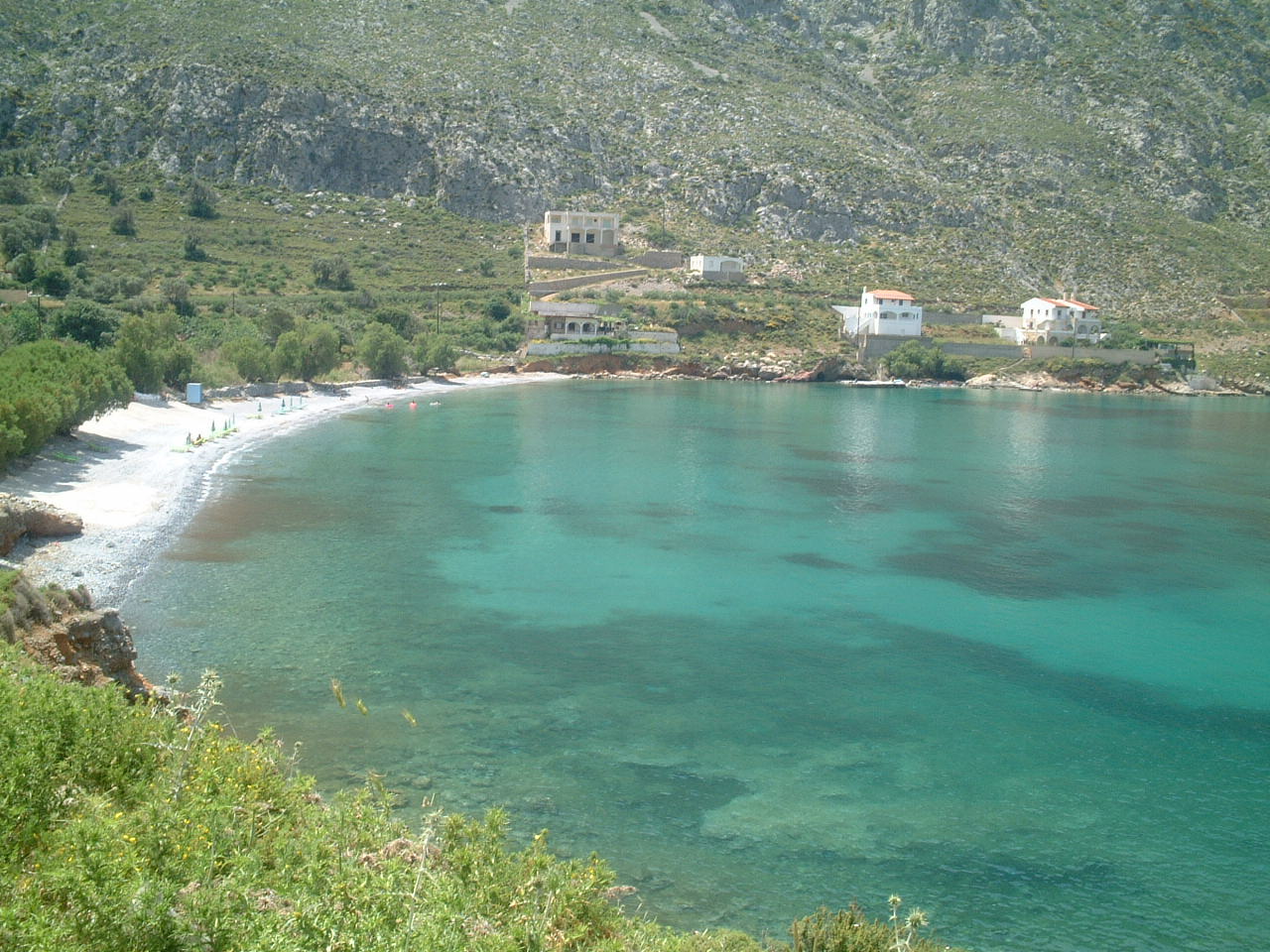 Foto van Masouri beach III met grijze fijne kiezelsteen oppervlakte