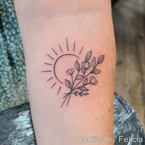 Explore flower arm sleeve tattoo ideas, creative tattoo ideas in Fort Myers, available at Tiger Lotus Tattoo and Piercing