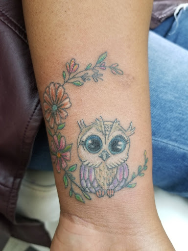 Explore tattoo ideas on side, creative tattoo ideas in Providence, available at F.I.N.A.O. Ink Tattoo Company