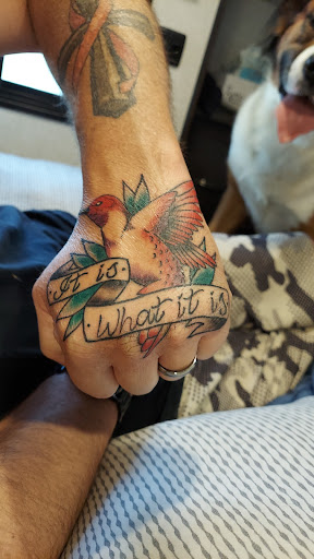 Explore snake tattoo idea, creative tattoo ideas in Medford, available at Rogue Tattoo