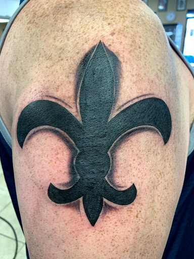 Explore money tattoos ideas, creative tattoo ideas in Gulfport, available at Jack & Dianes Tattoo