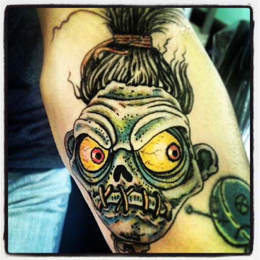 Explore tattoo ideas with crosses, creative tattoo ideas in Pikeville, available at The Carbon Canary Tattoo Studio