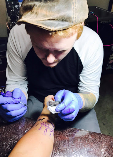 Explore leo tattoo ideas for men, creative tattoo ideas in Bismarck, available at Alchemist Tattoo & Body Piercing