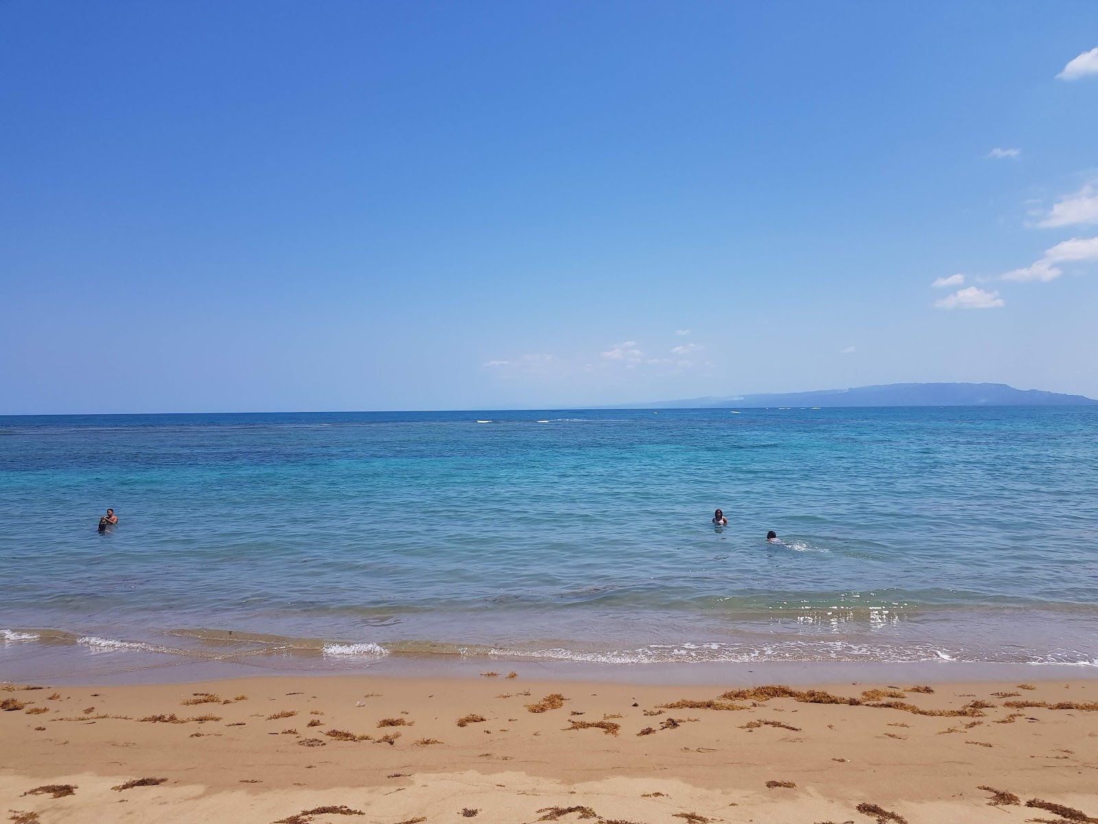 Fotografija Playa Poza de Bojolo z svetel fin pesek površino